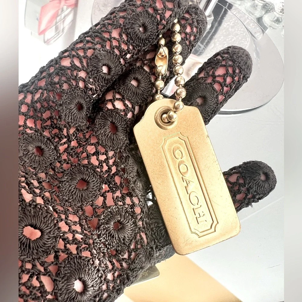 Coach color brass  metal tag